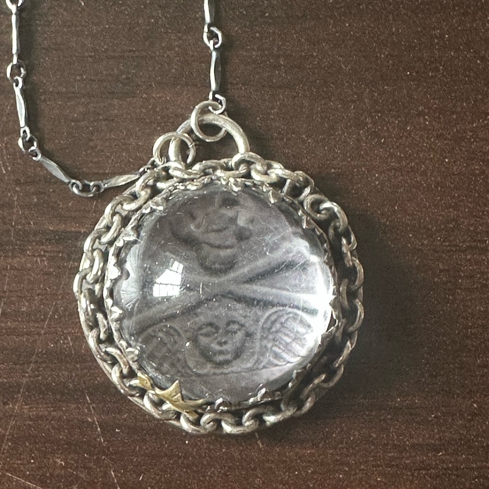 Sterling silver memento mori necklace